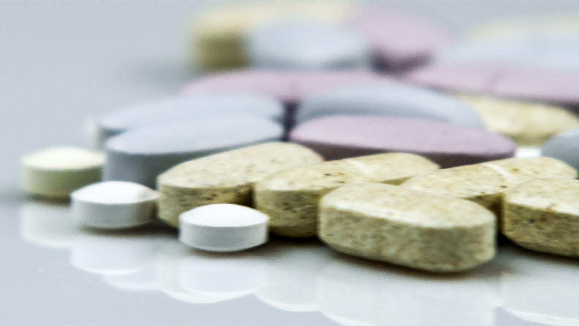 Panning shot across supplement pills.