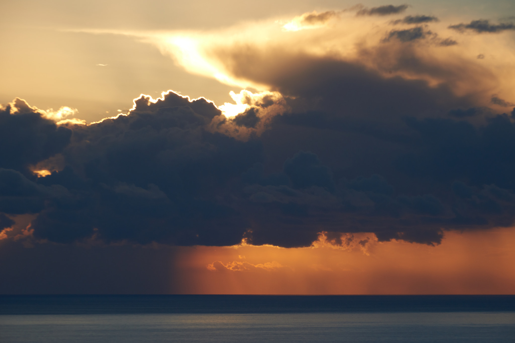 Nikon D810 sample photo. Drama behind black cloud at sunset photography