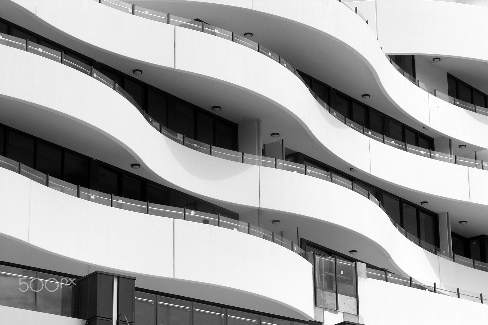 Olympus C8080WZ sample photo. The wavy building photography