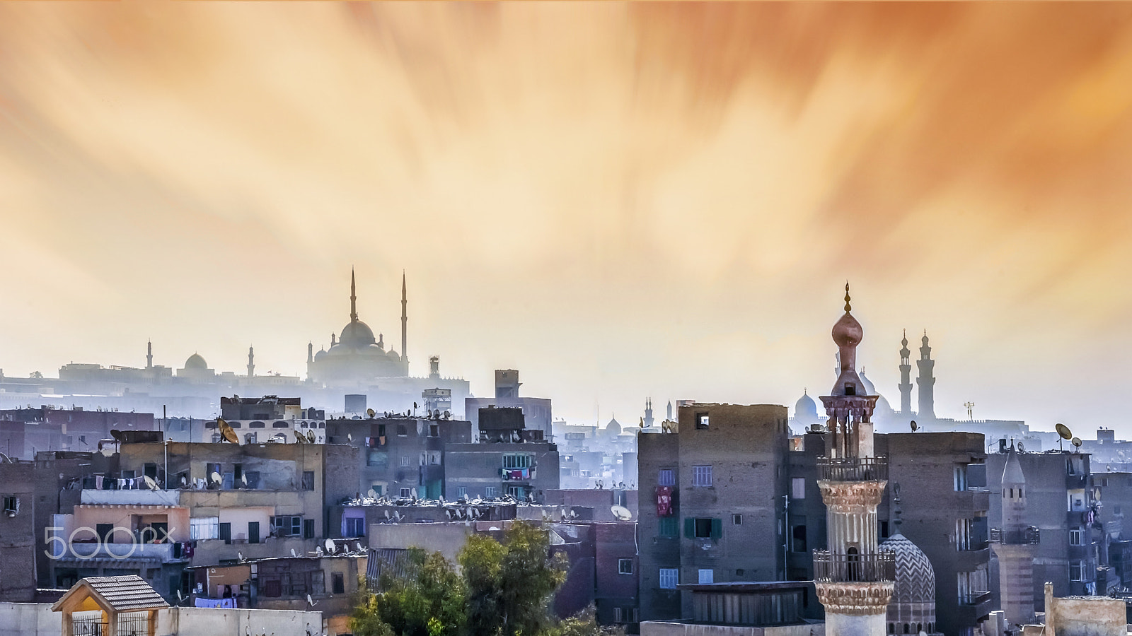 Nikon D7200 + Sigma 18-50mm F2.8 EX DC Macro sample photo. Minarets between buildings skyline of majestic cai photography