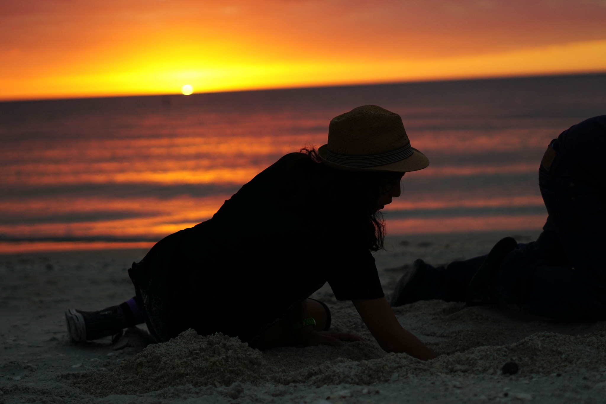 Sony FE 50mm F1.8 sample photo. Digging at sunset photography