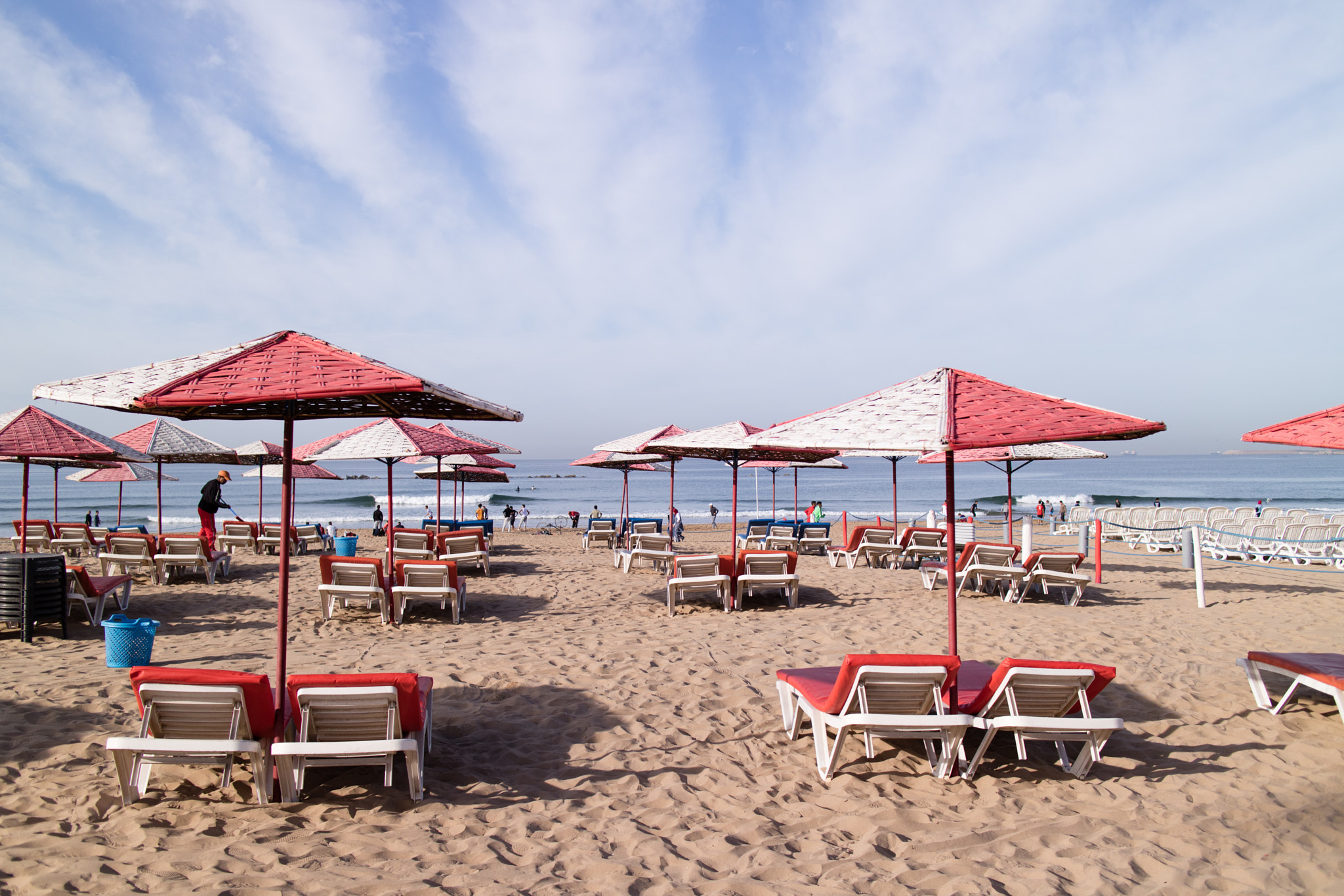 Canon EOS M3 sample photo. Red and white umbrellas on the beach photography