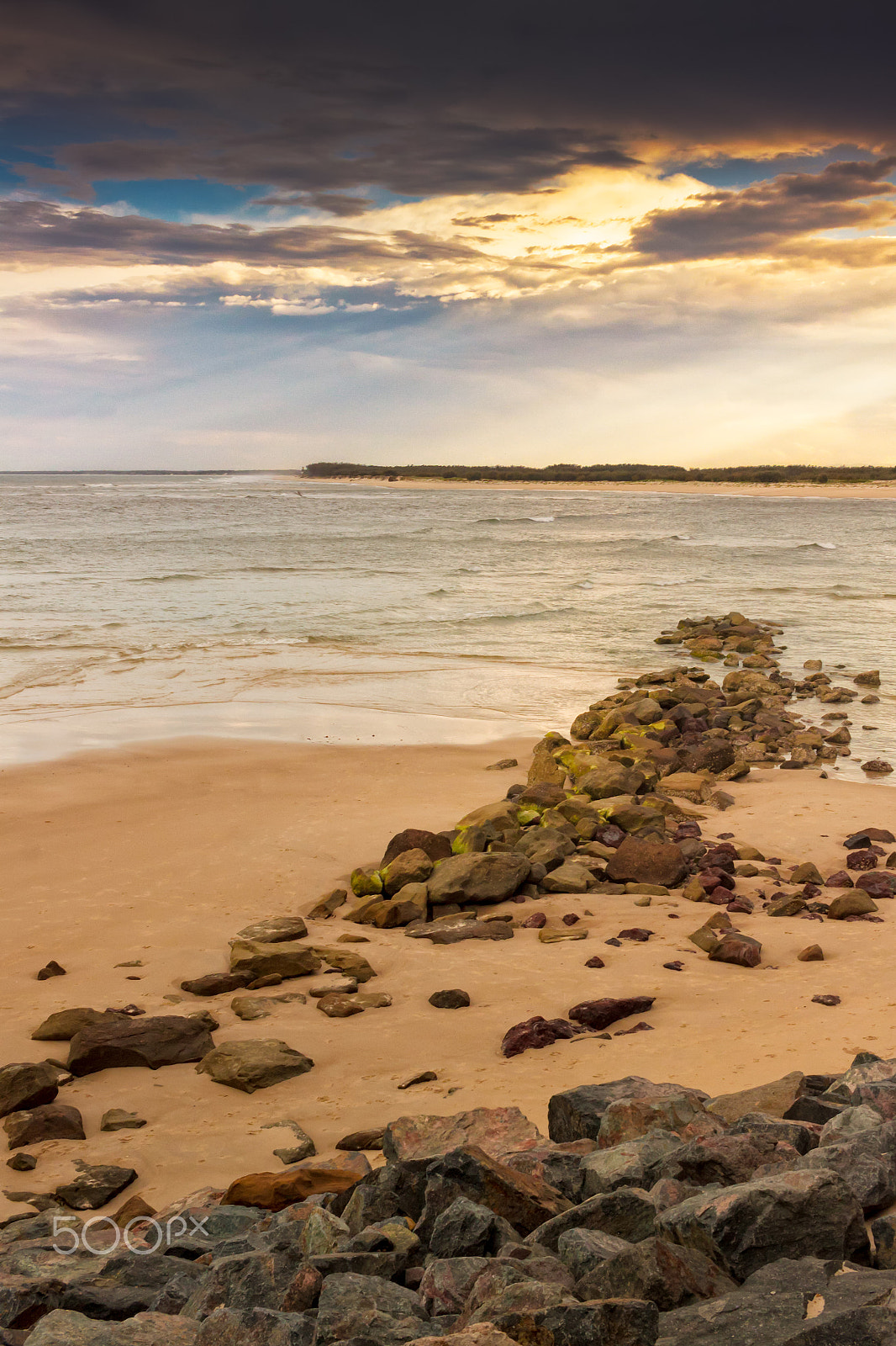 Canon EF-S 24mm F2.8 STM sample photo. Sun rays through the dark clouds photography
