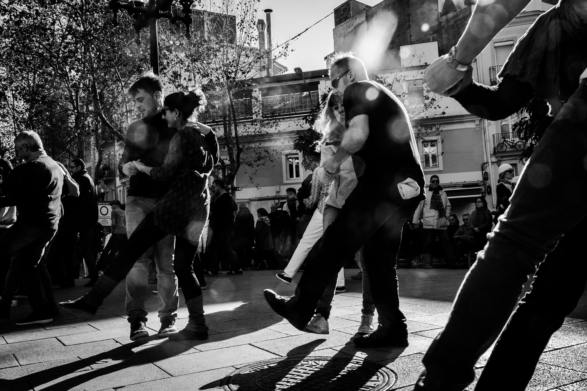 Canon EF 75-300mm F4.0-5.6 IS USM sample photo. Dancing n the square photography