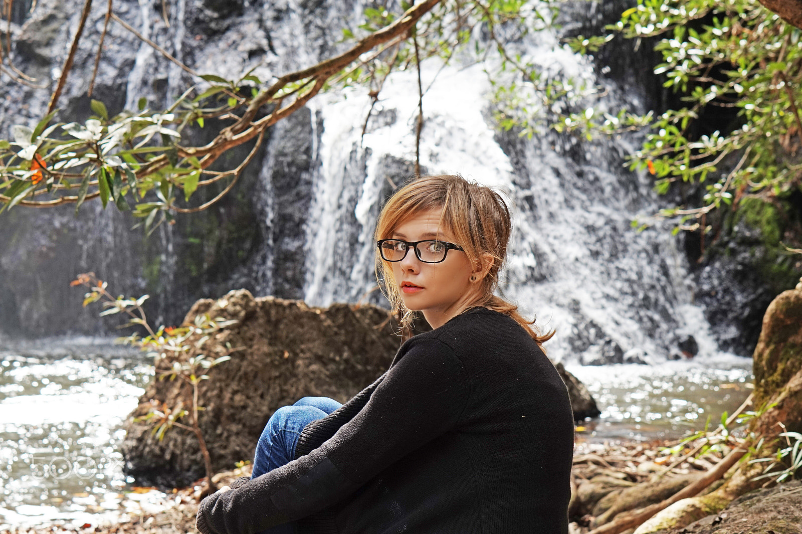 Sony Alpha a5000 (ILCE 5000) + E 50mm F1.8 OSS sample photo. Sitting by the waterfall photography