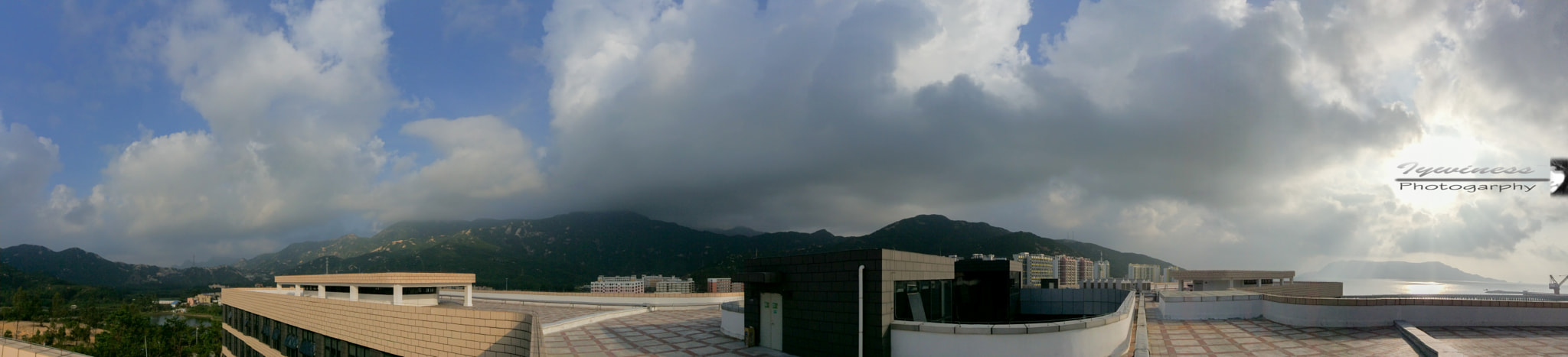 iPad mini 2 back camera 3.3mm f/2.4 sample photo. On the roof photography