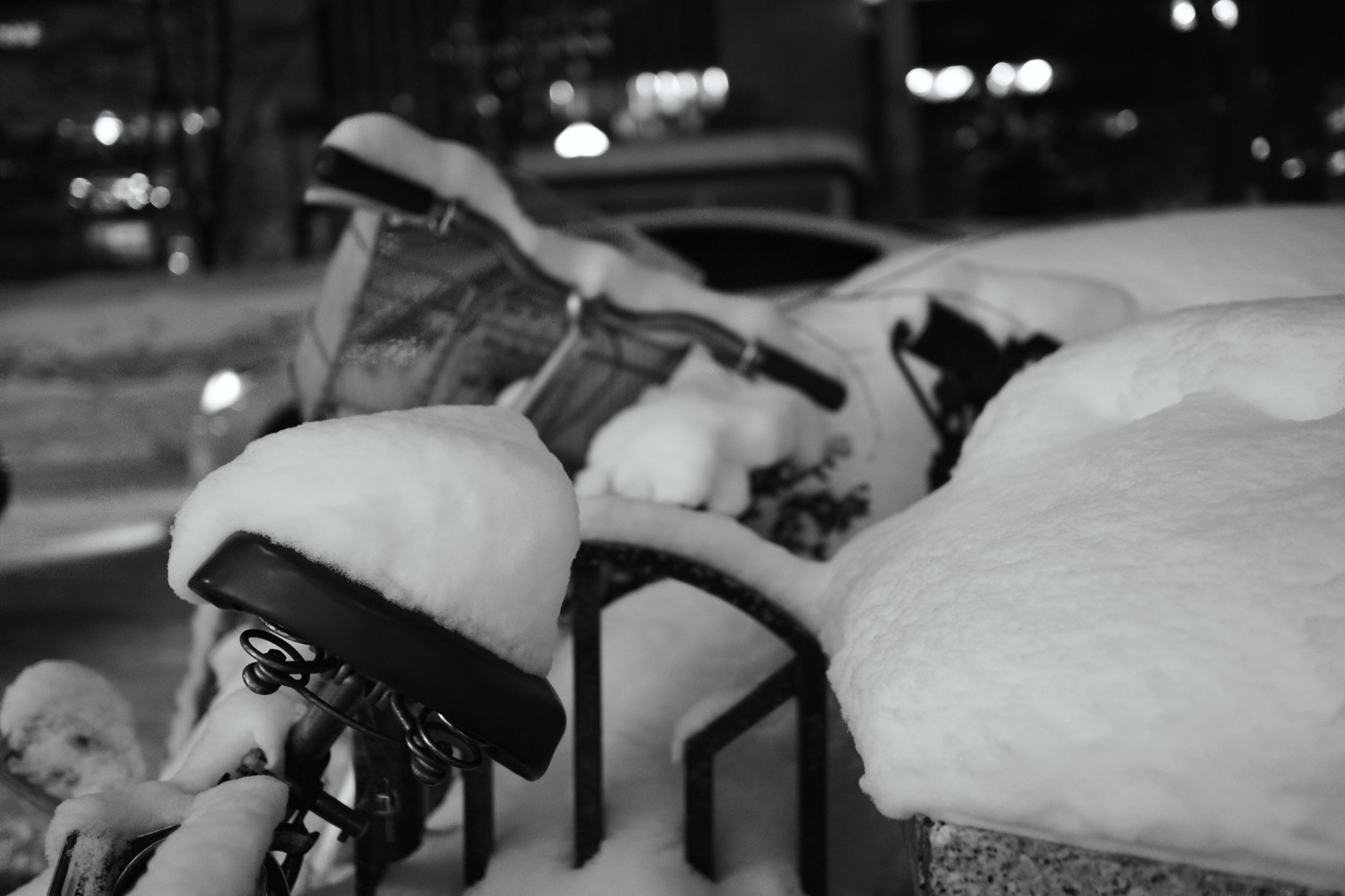 Sony Sonnar T* E 24mm F1.8 ZA sample photo. Bicycle buried in snow photography