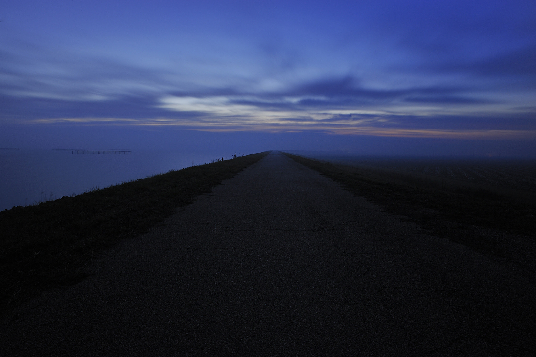 Nikon D700 sample photo. The road divides  land from the sea. delta del po photography