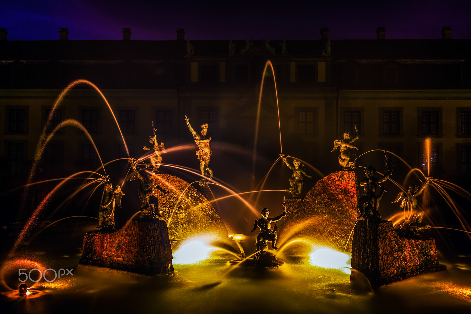 Canon EF 35mm F2 IS USM sample photo. Night fountain photography