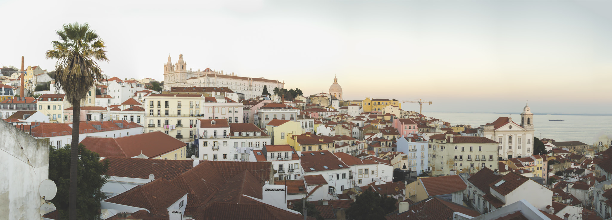 Nikon D3100 + Nikon AF Nikkor 20mm F2.8D sample photo. Alfama at sunset photography