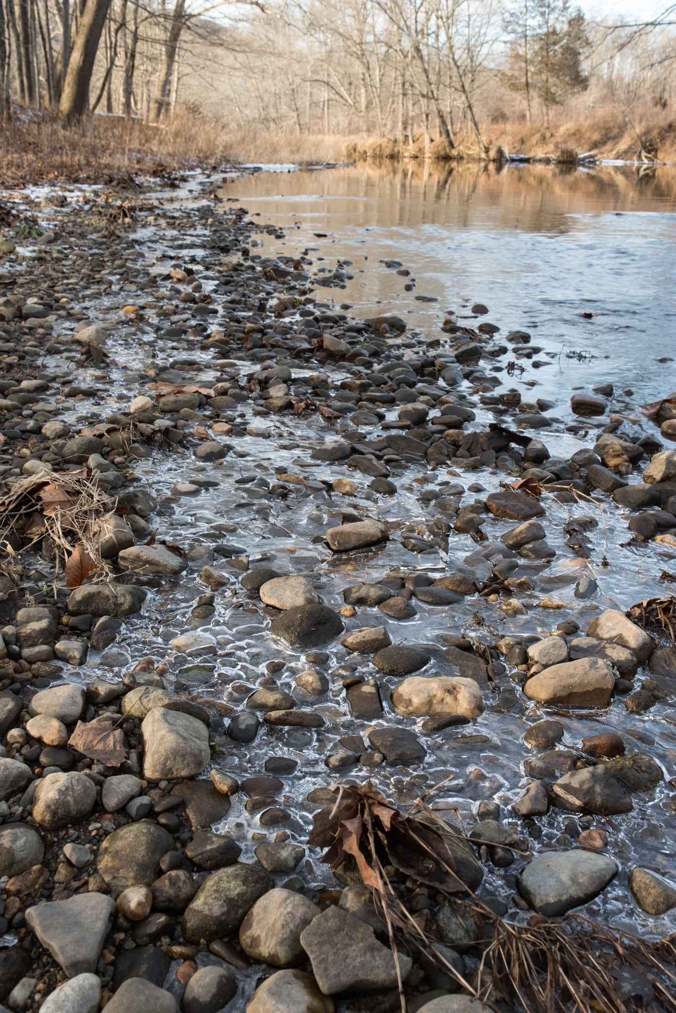 Pentax K-1 + Sigma 35mm F1.4 DG HSM Art sample photo. Ice and pebbles by stream photography