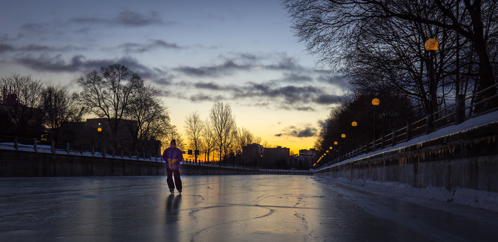 Canon EOS 600D (Rebel EOS T3i / EOS Kiss X5) + Canon EF 16-35mm F4L IS USM sample photo. Early morning skate on the rideau photography