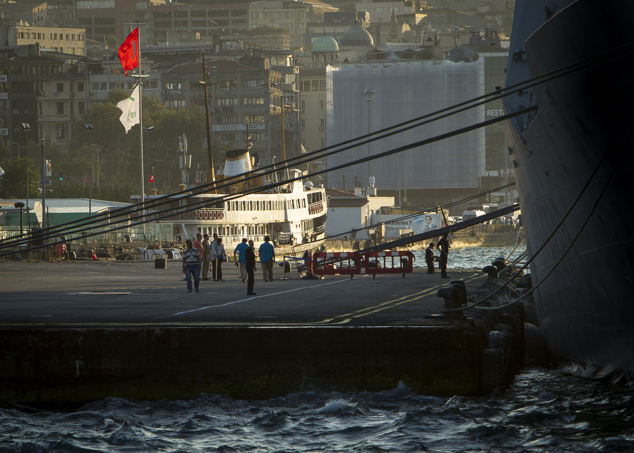 Canon EOS-1D Mark IV + Canon EF 70-200mm F2.8L IS USM sample photo. Sunset flags istanbul harbor photography