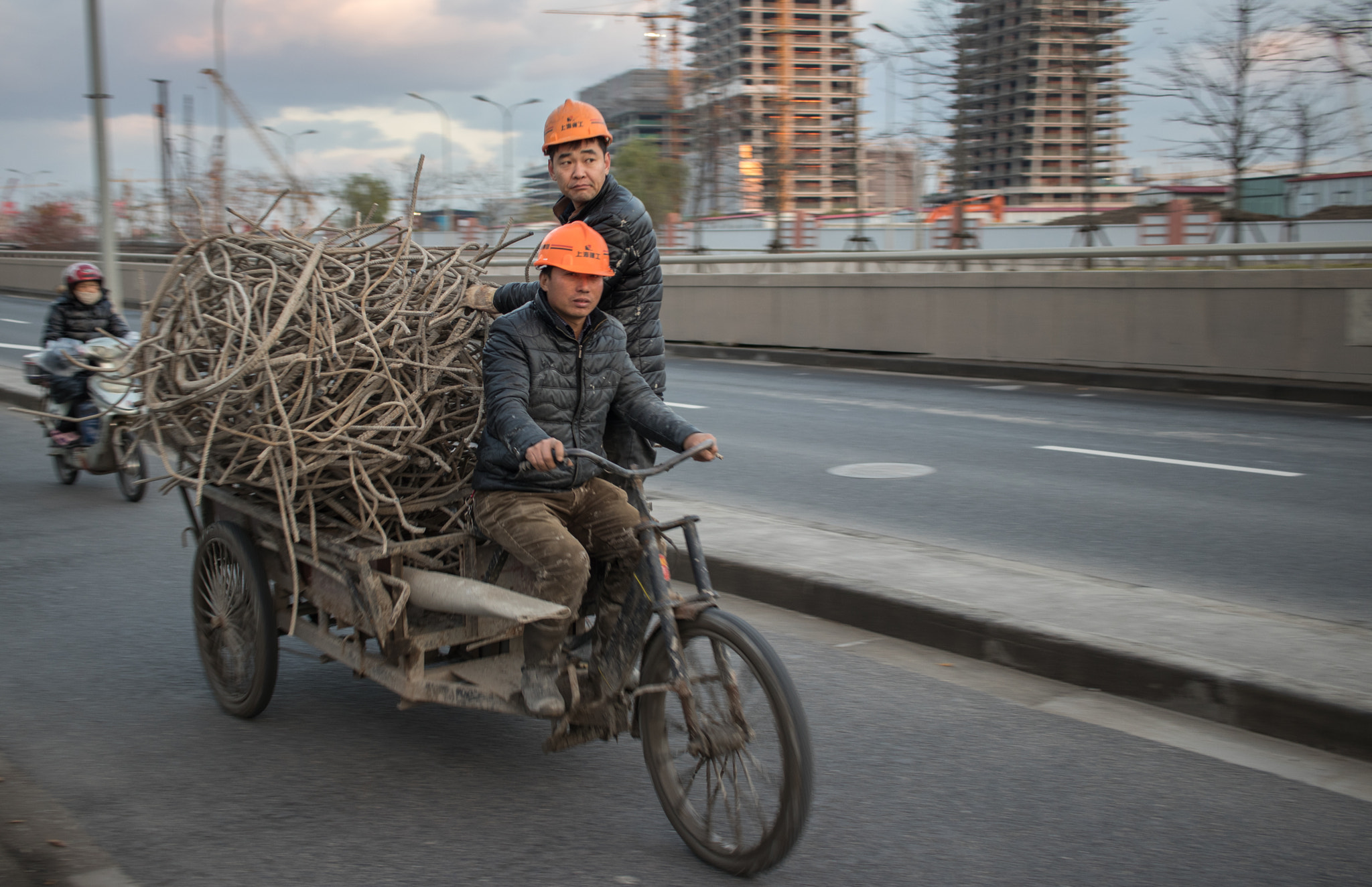 Canon EF-S 24mm F2.8 STM sample photo. Workers on tricycle photography