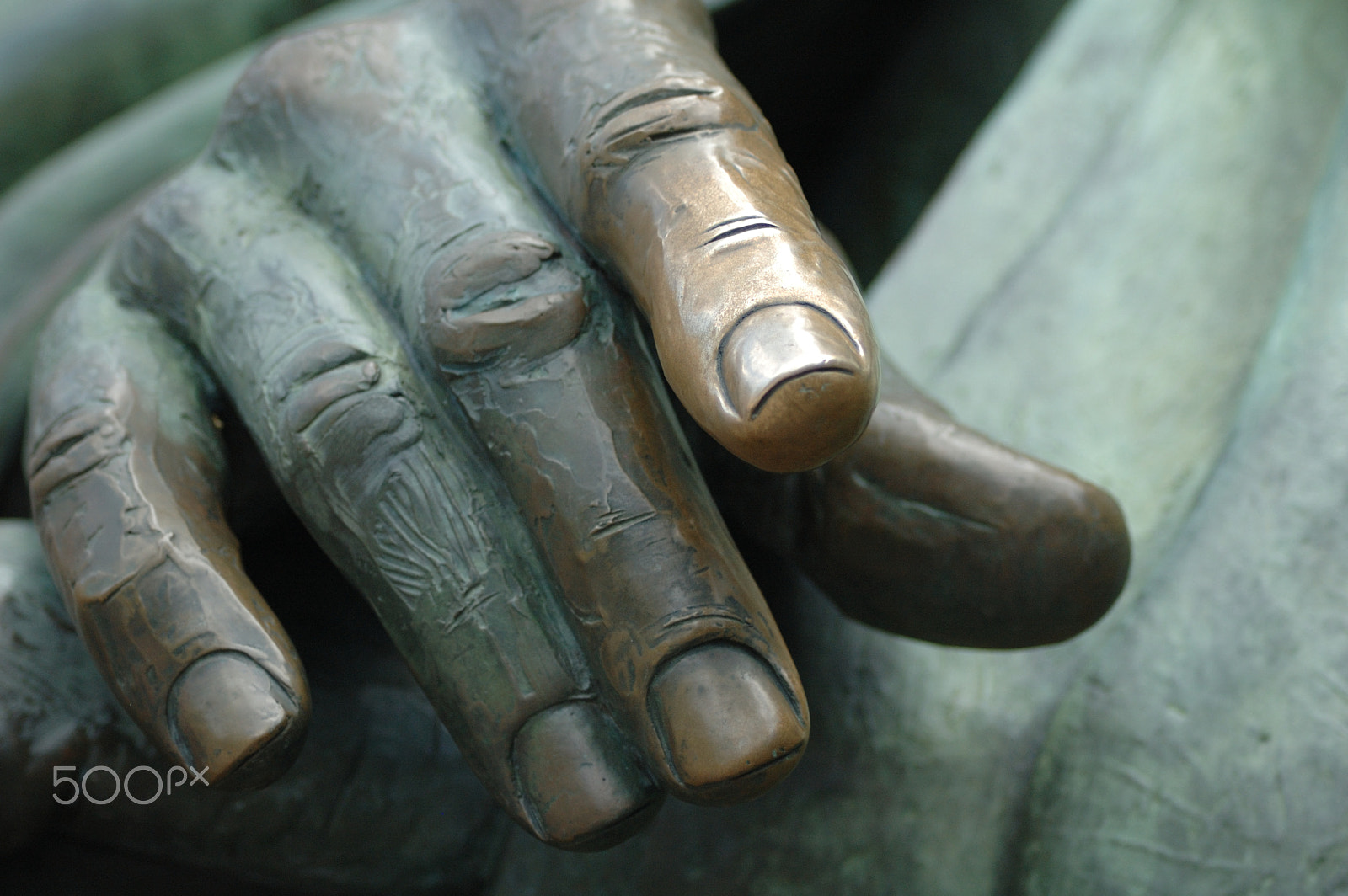 Nikon D70 sample photo. Bronze hand photography