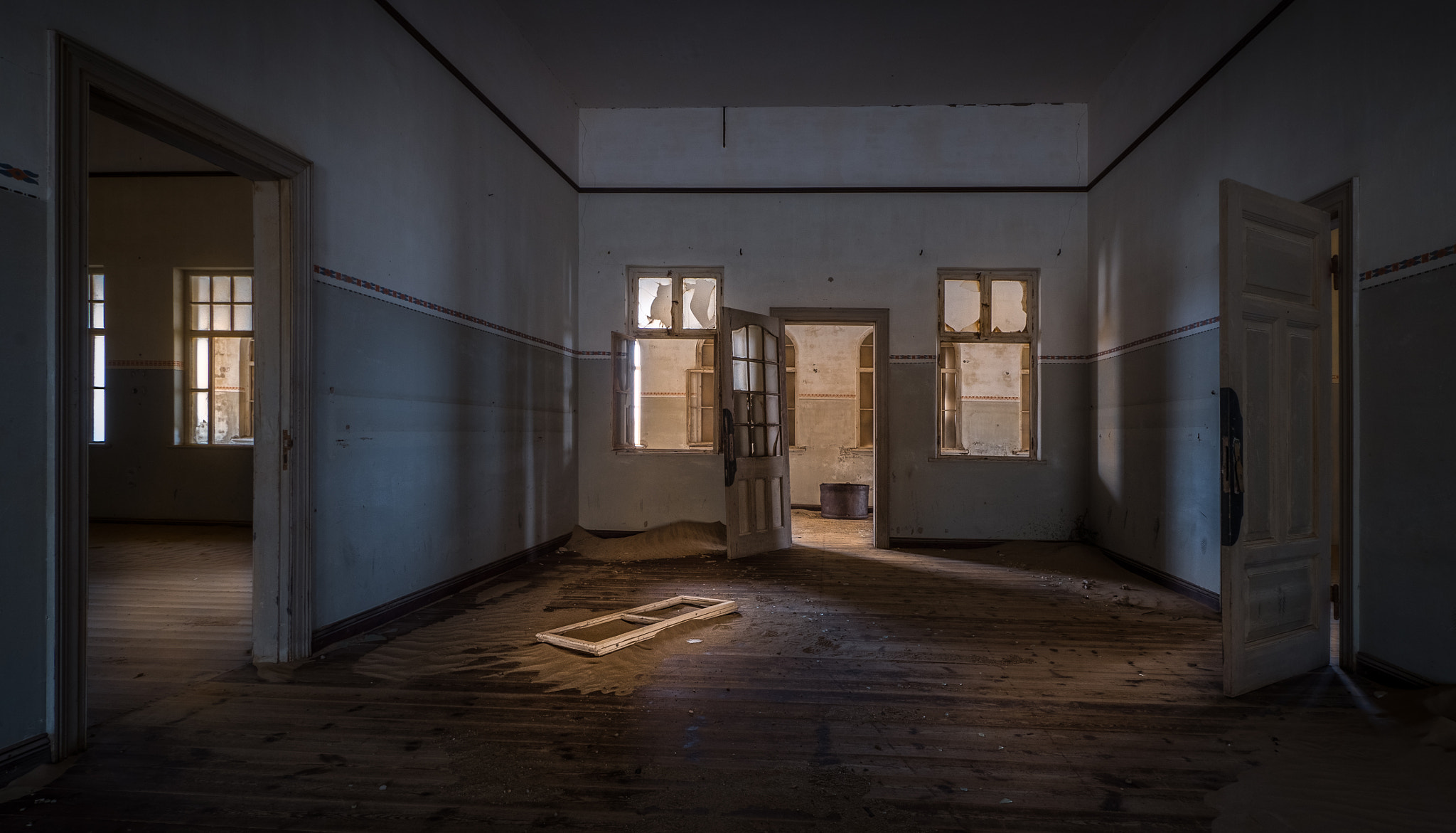 Panasonic Lumix DMC-GX7 + Panasonic Lumix G Vario 7-14mm F4 ASPH sample photo. Abandoned schoolhouse, kolmanskop, namibia photography