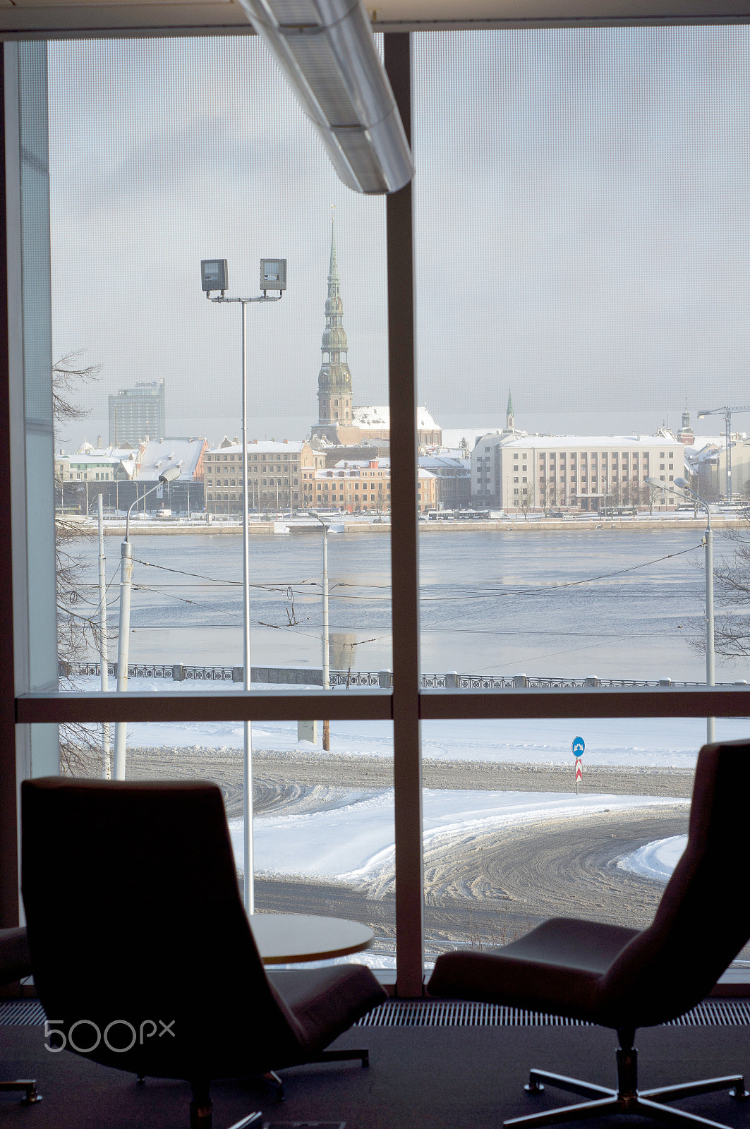 Sony Alpha DSLR-A580 sample photo. View to old riga through a window of latvian national library photography