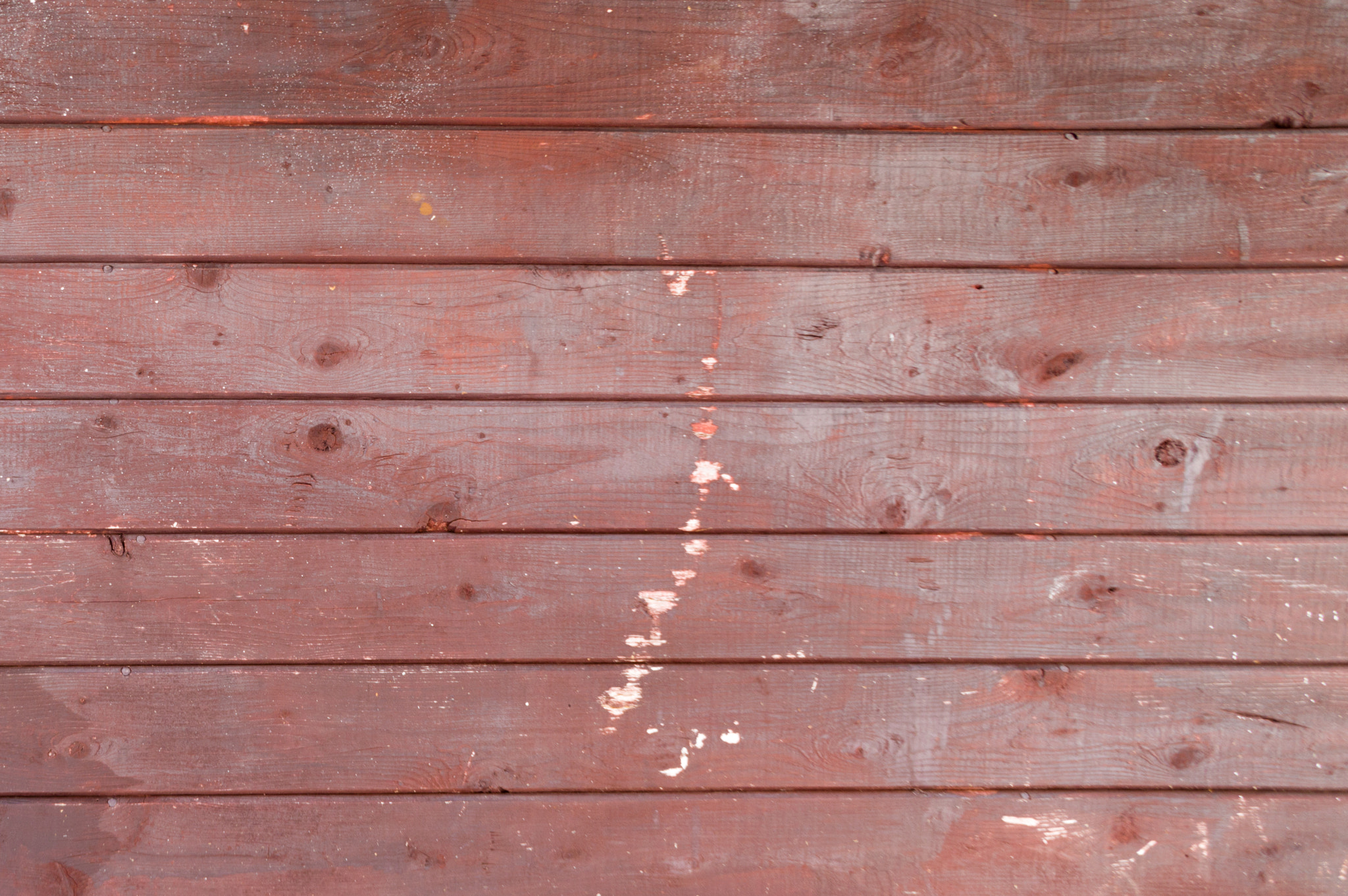 Nikon D3200 sample photo. Faded old oxblood red barn boards background photography