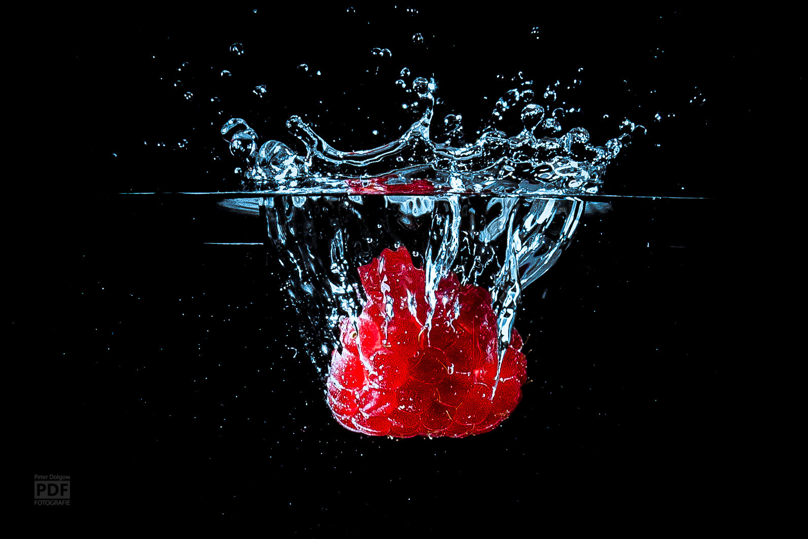 Sony 50mm F1.4 sample photo. Himbeere splash  photography