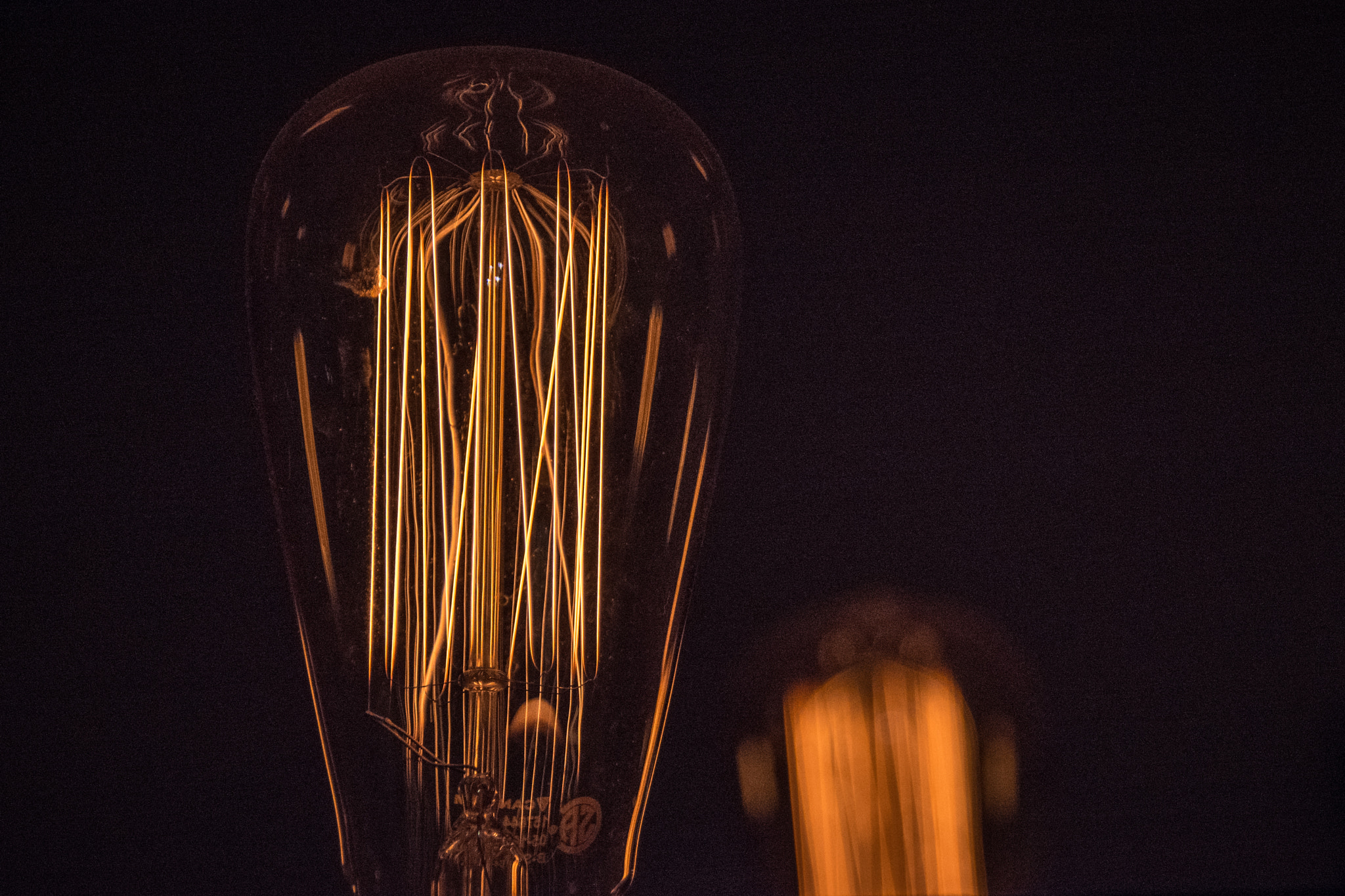 Sigma 18-250mm F3.5-6.3 DC Macro OS HSM sample photo. Edison bulb - dimmed photography