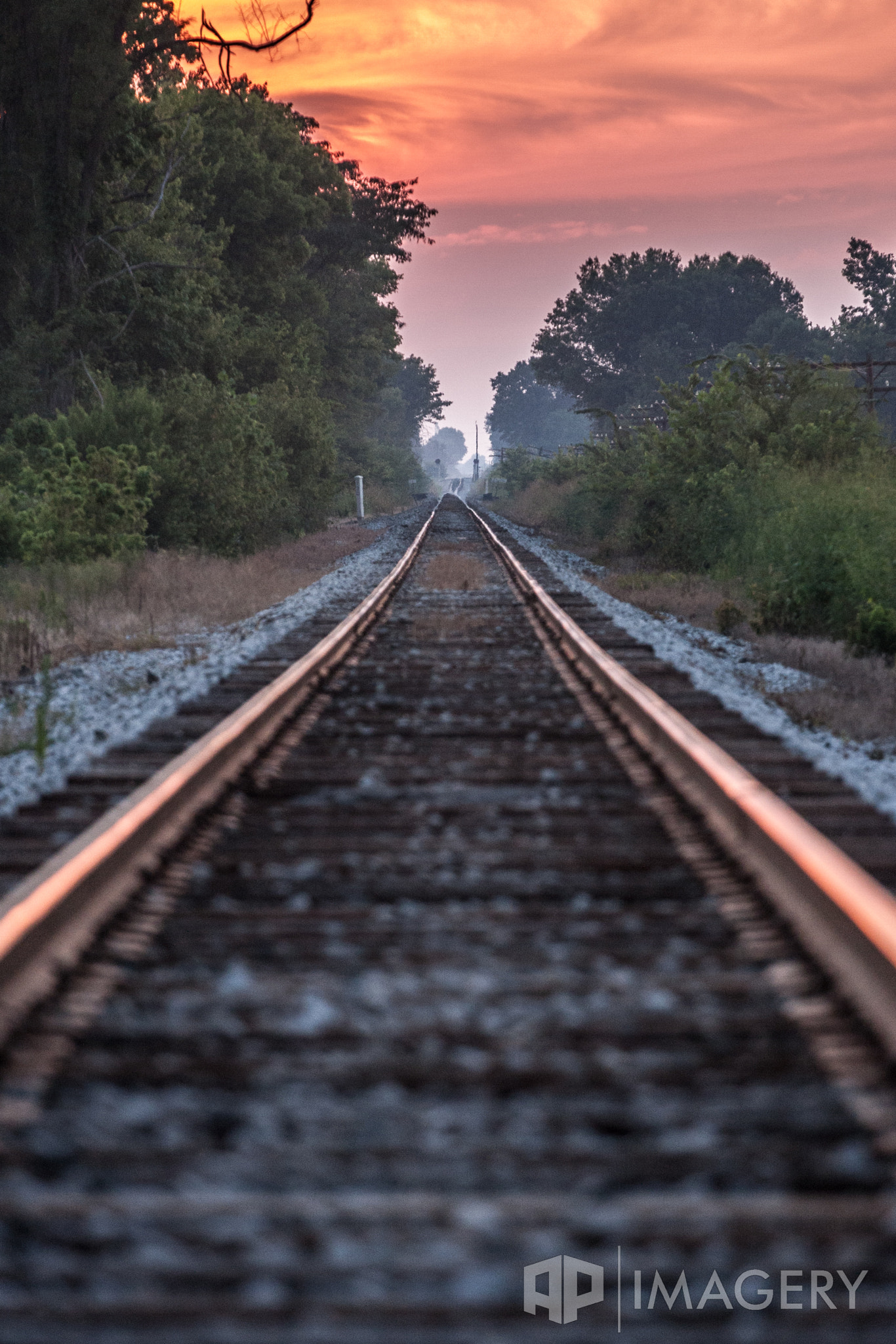 Canon EOS 40D + Canon EF 70-200mm F4L USM sample photo. Railroad at sunset photography