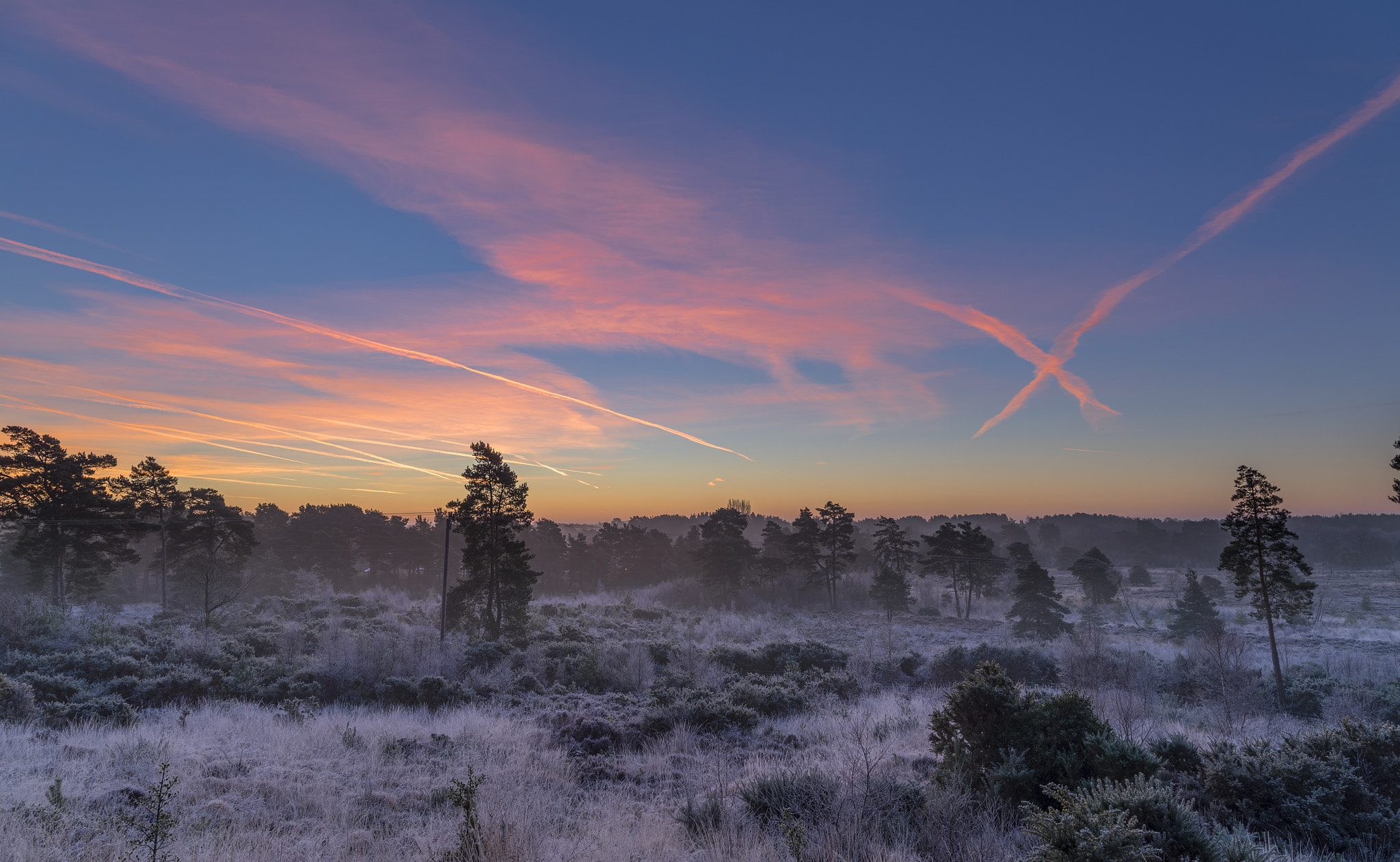 Canon EF 24-105mm F3.5-5.6 IS STM sample photo. Pink contrail dawn photography