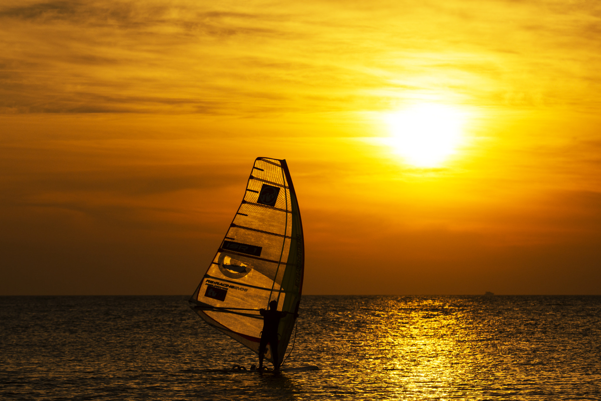Nikon AF-S Nikkor 70-200mm F2.8G ED VR II sample photo. Boat at sunset photography