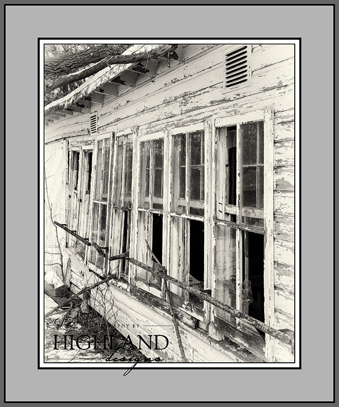 Canon EF-S 17-85mm F4-5.6 IS USM sample photo. Abandoned migrant housing b&w photography