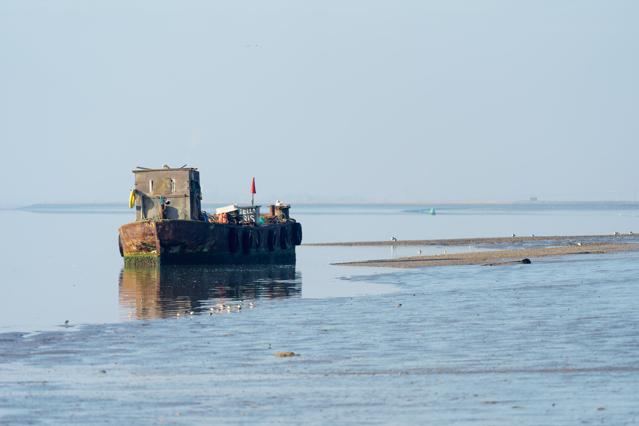 Sony a7 II sample photo. View of an old boat on the river swale photography