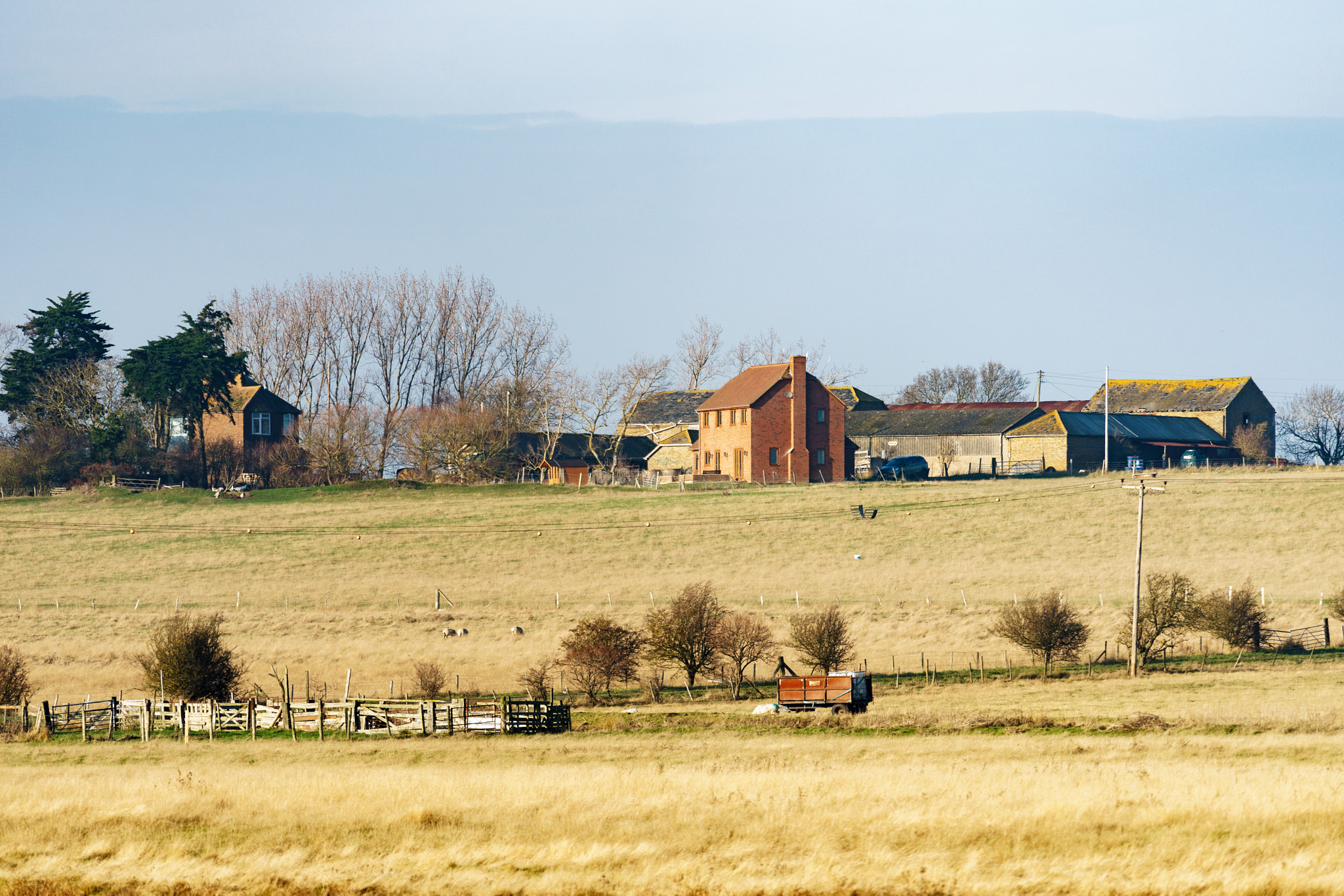 Sony a7 II + Sony FE 70-300mm F4.5-5.6 G OSS sample photo. View of a farm on harty island in kent photography