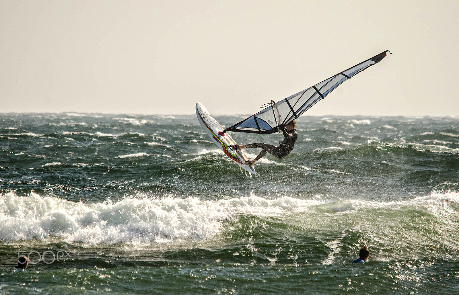 Sigma 150-500mm F5-6.3 DG OS HSM sample photo. Surfing and jumping photography