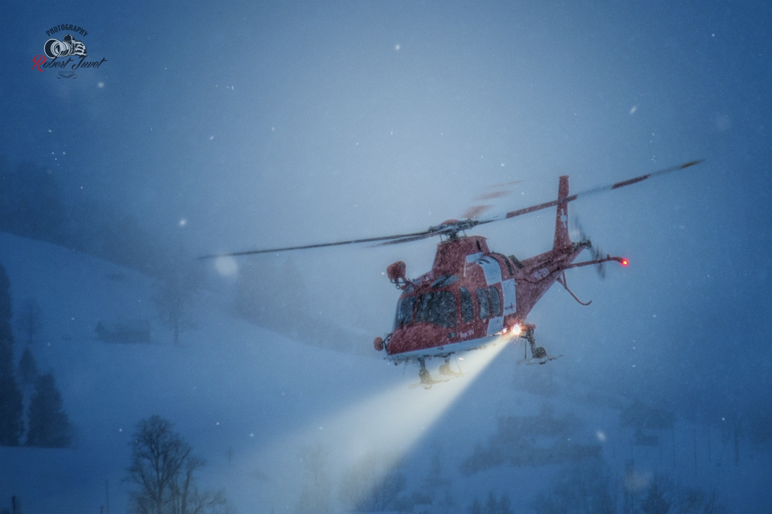 Nikon D810 sample photo. Helikopter der rettungsorganisation rega im einsatz bei wind und wetter photography