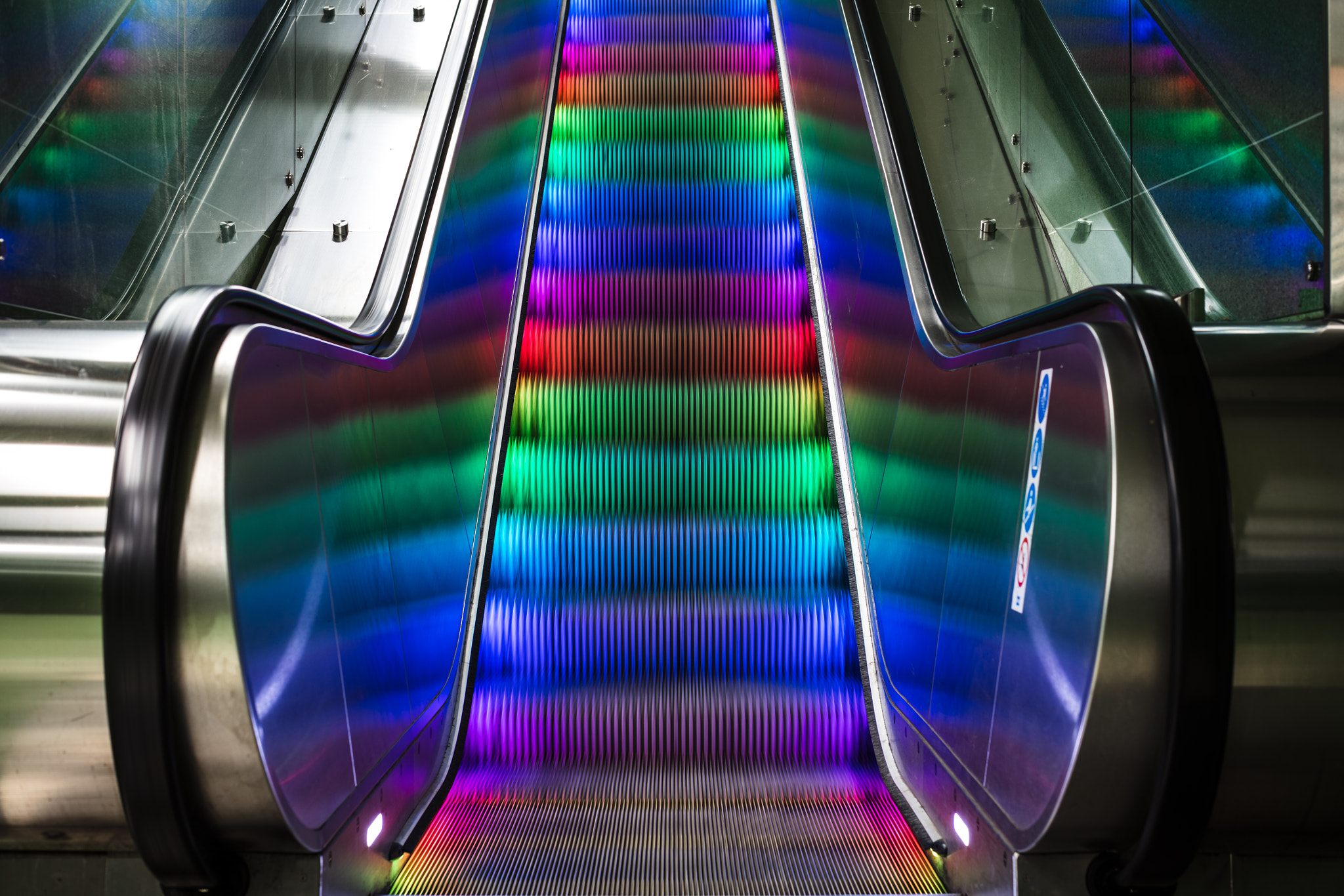 Canon EOS 5DS R + Canon EF 50mm F1.2L USM sample photo. Rainbow escalator photography