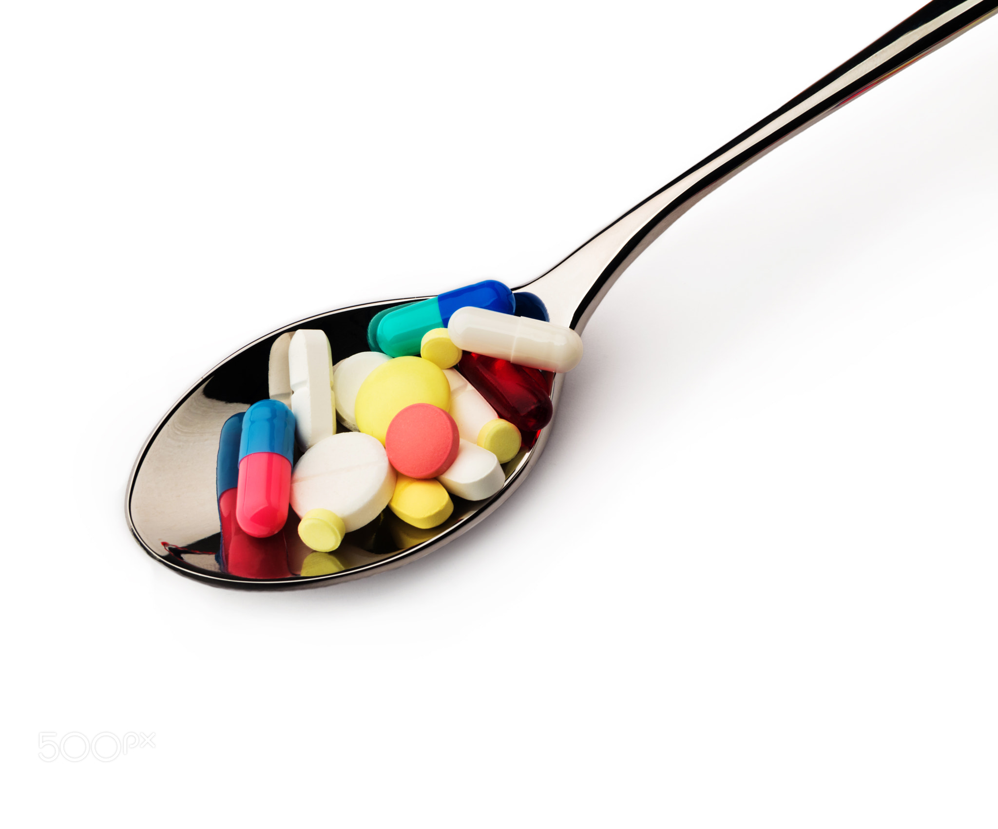 Disease. A lot of pills into spoon