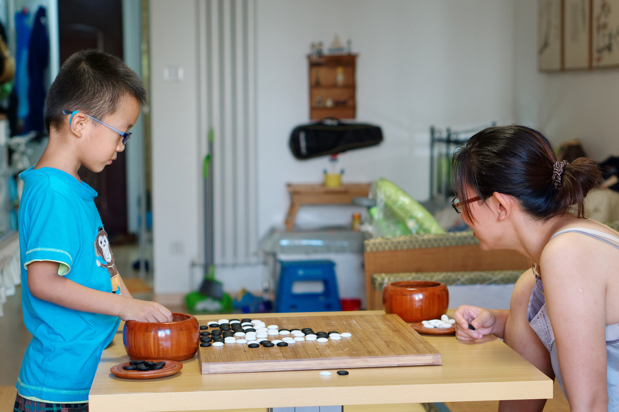 E 50mm F1.8 OSS sample photo. Weiqi,go photography