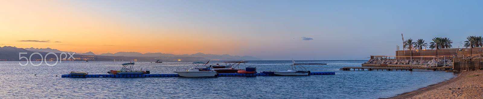 Nikon D7200 + Nikon AF-S Nikkor 50mm F1.4G sample photo. Panorama of boats at sunrise in gulf of aqaba photography