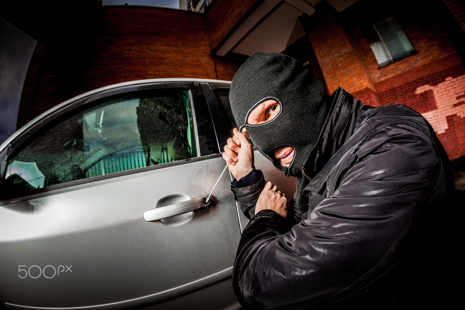 Canon EOS 5D Mark II + Canon EF 15mm F2.8 Fisheye sample photo. Car thief in a mask. photography