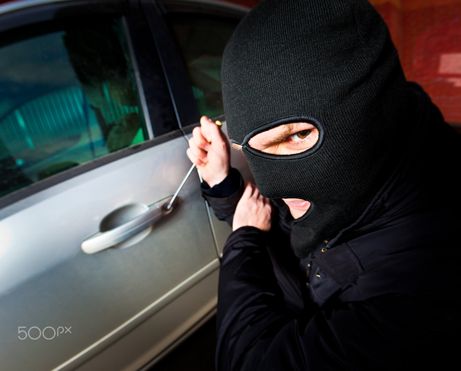 Canon EOS 5D Mark II + Canon EF 15mm F2.8 Fisheye sample photo. Robber and the thief in a mask hijacks the car photography