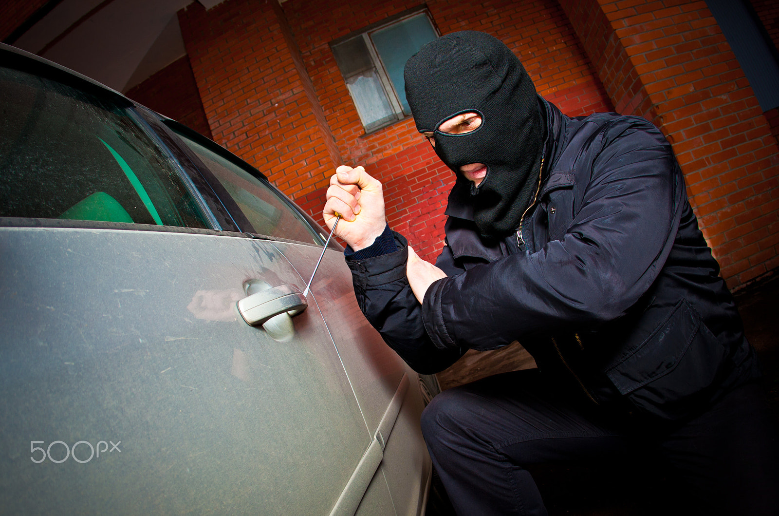 Canon EOS 5D Mark II + Canon EF 15mm F2.8 Fisheye sample photo. Robber and the thief in a mask hijacks the car photography