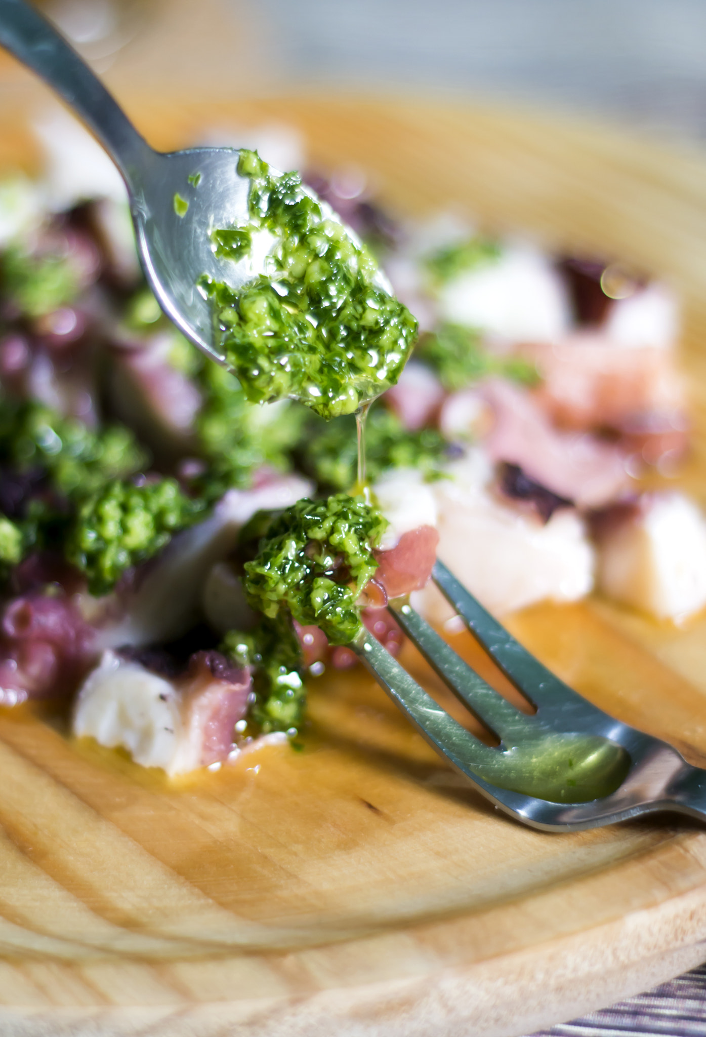 Octopus with paprika and beer, typical dish of Spain, on a woode