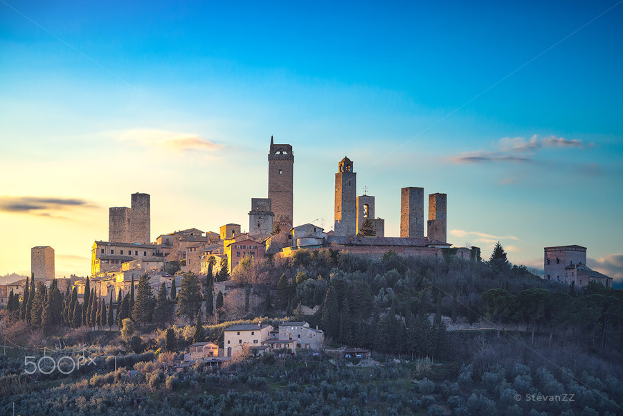 Sony a7R II + Canon EF 100-400mm F4.5-5.6L IS II USM sample photo. San gimignano town skyline and medieval towers sunset. tuscany, photography