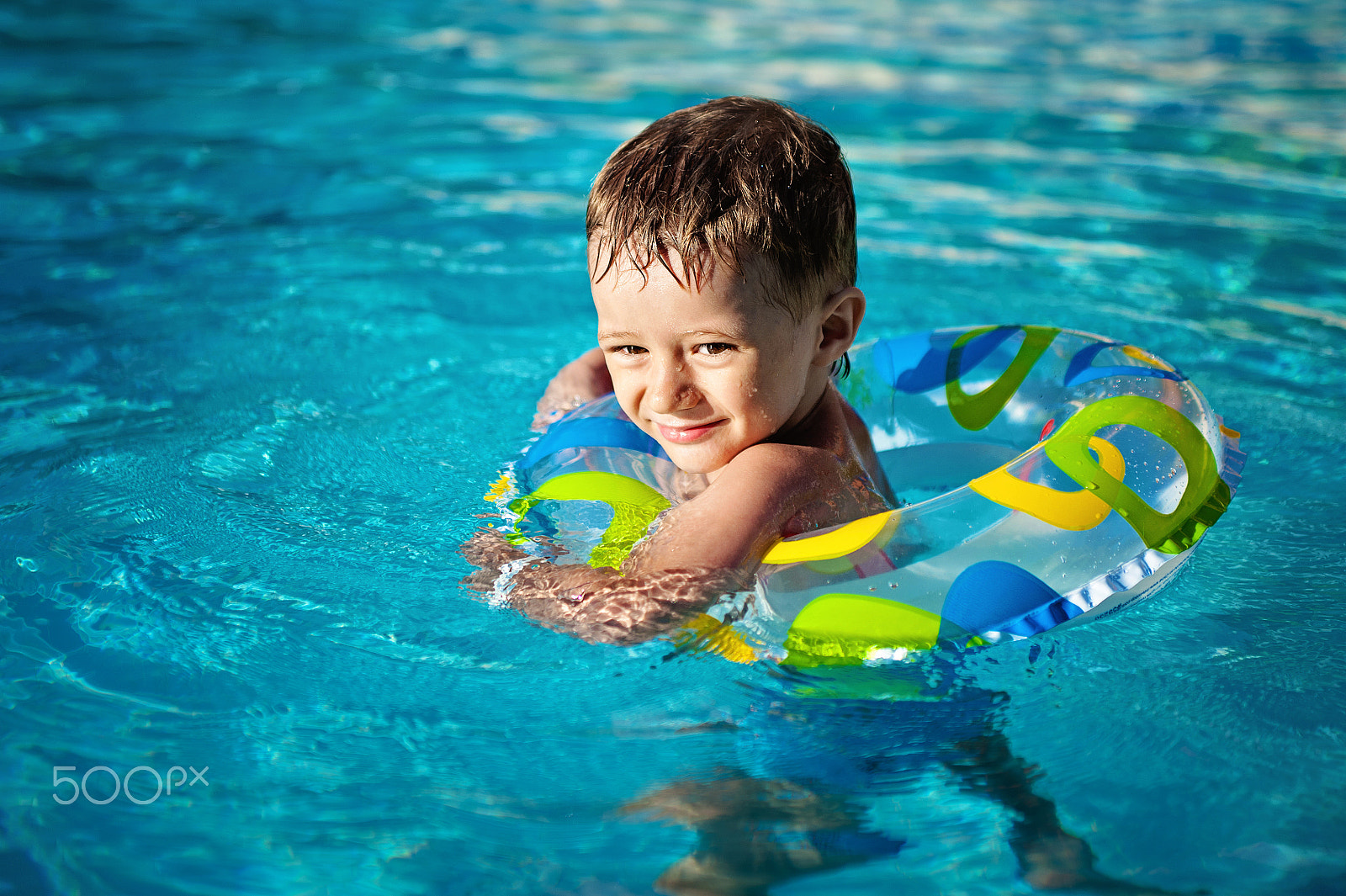 Nikon D700 + Sigma 24-70mm F2.8 EX DG Macro sample photo. Happy little caucasian boy learning swim with saver in pool, teeth smiley   a life ring enjoying ... photography