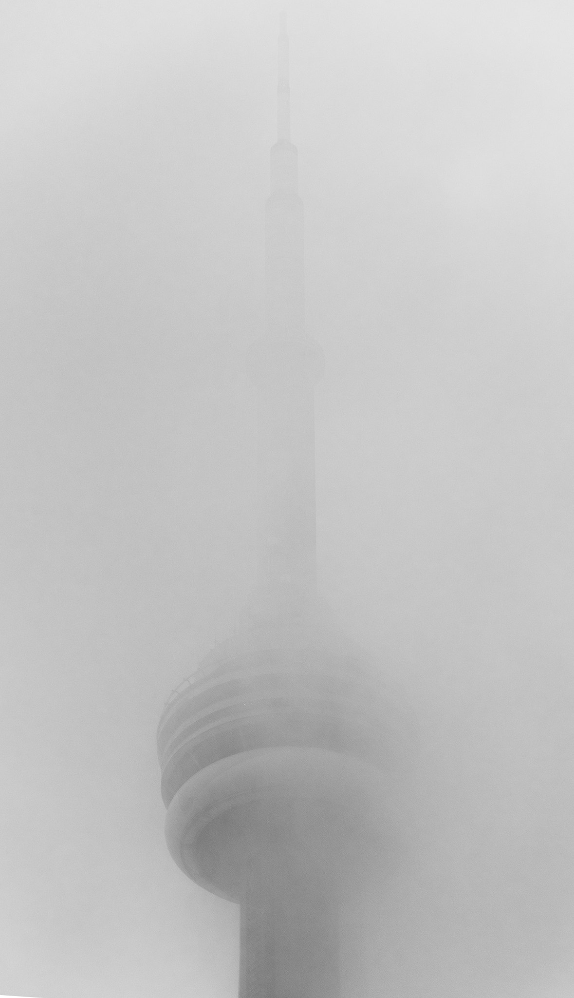 Nikon D810 sample photo. Cn tower covered in fog photography