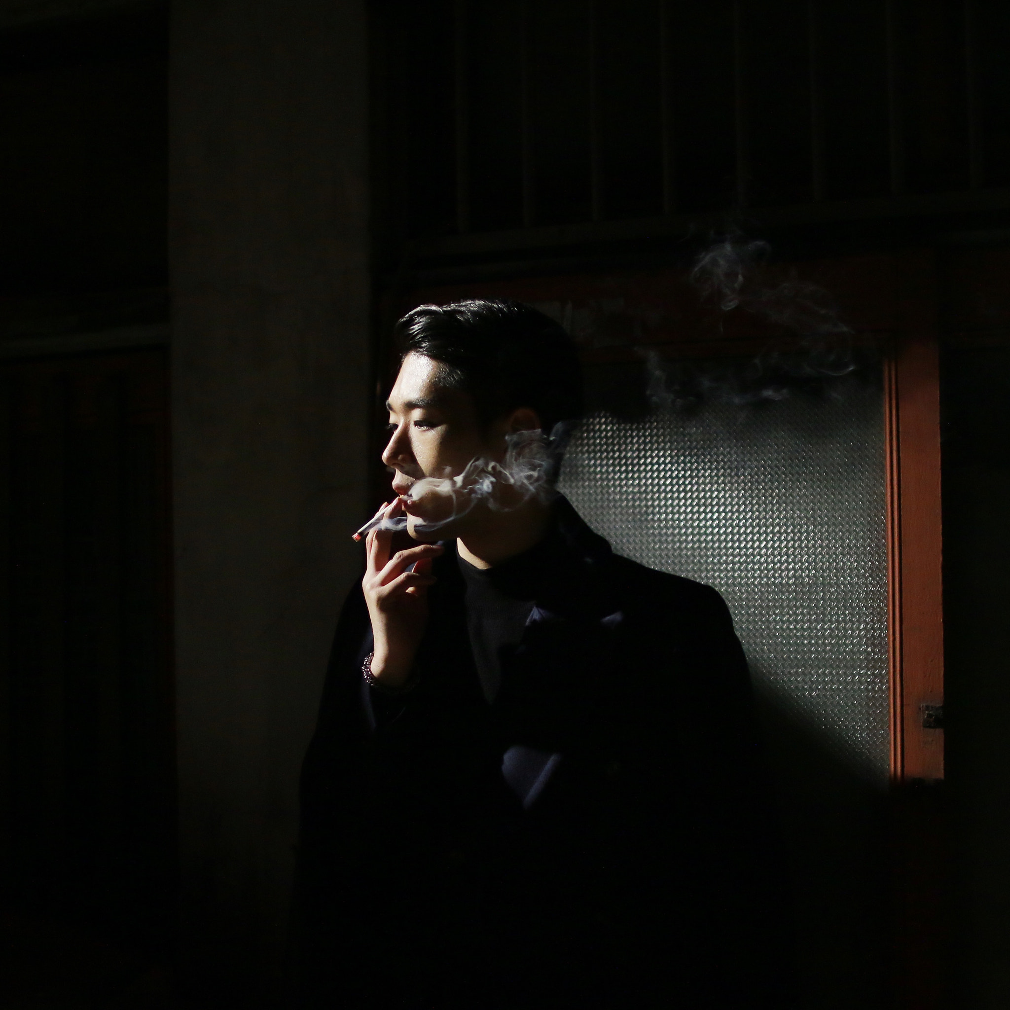 Sigma 30mm F1.4 EX DC HSM sample photo. Man in the dark photography