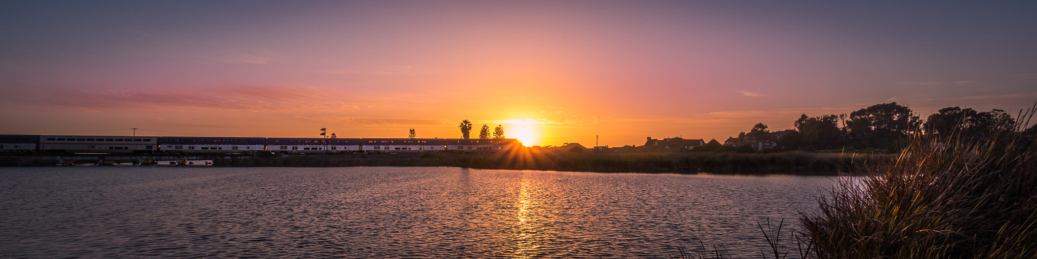 Fujifilm X-T10 + Fujifilm XF 10-24mm F4 R OIS sample photo. Train vs. sunset photography