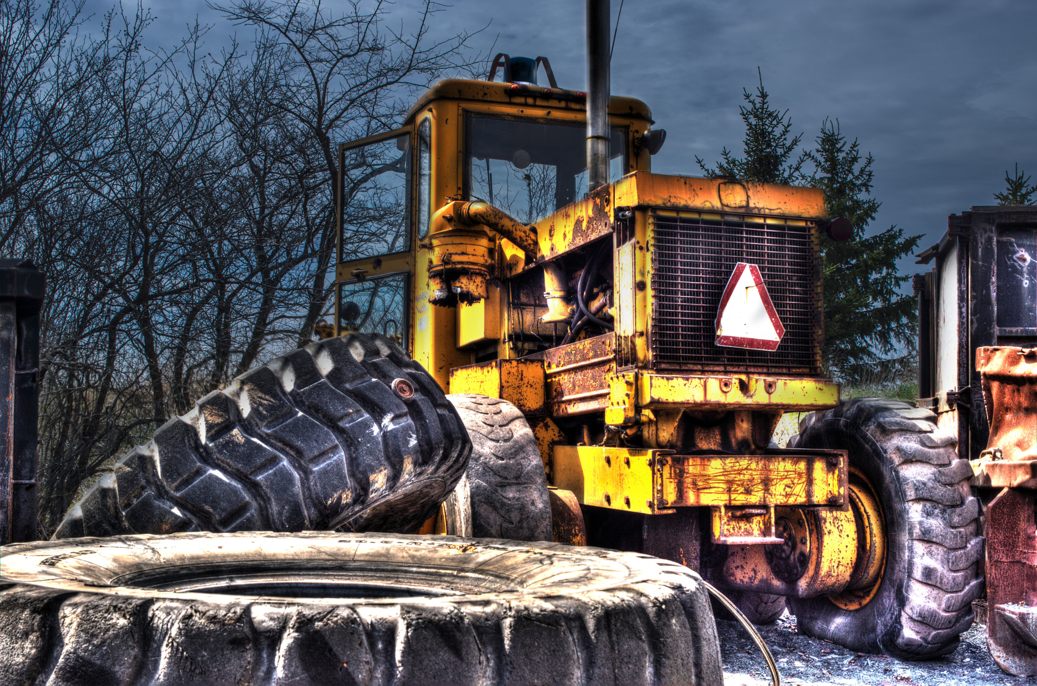 Sony SLT-A77 + 24-70mm F2.8 sample photo. Junkyard tractor photography