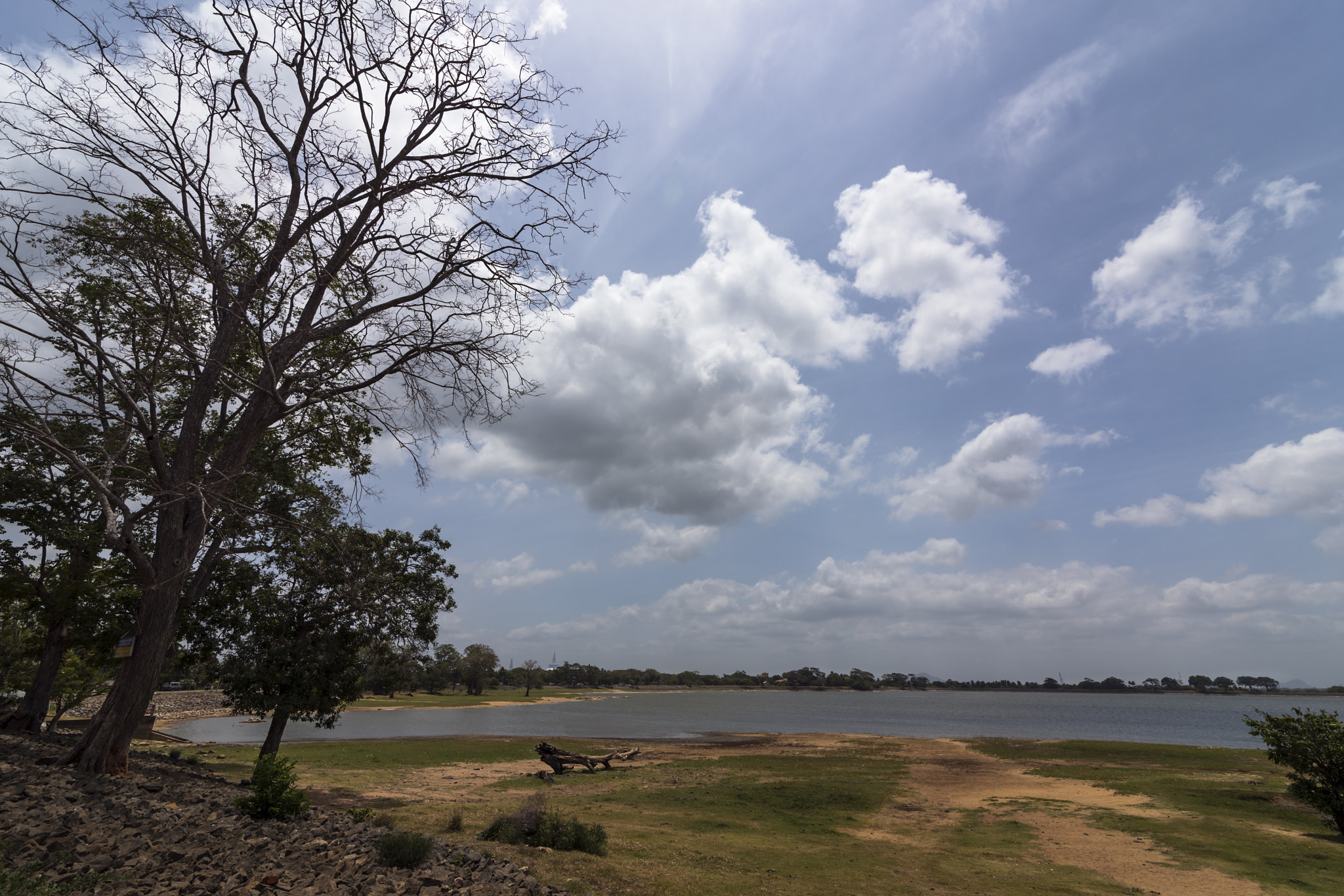 Tokina AT-X 16-28mm F2.8 Pro FX sample photo. View across a lake in anuradhapura sri lanka photography