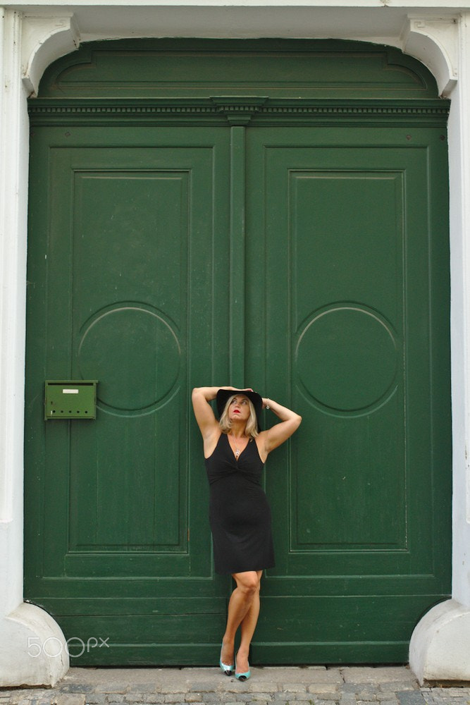 Sigma 35mm F1.4 DG HSM Art sample photo. Martina and green door, prague photography