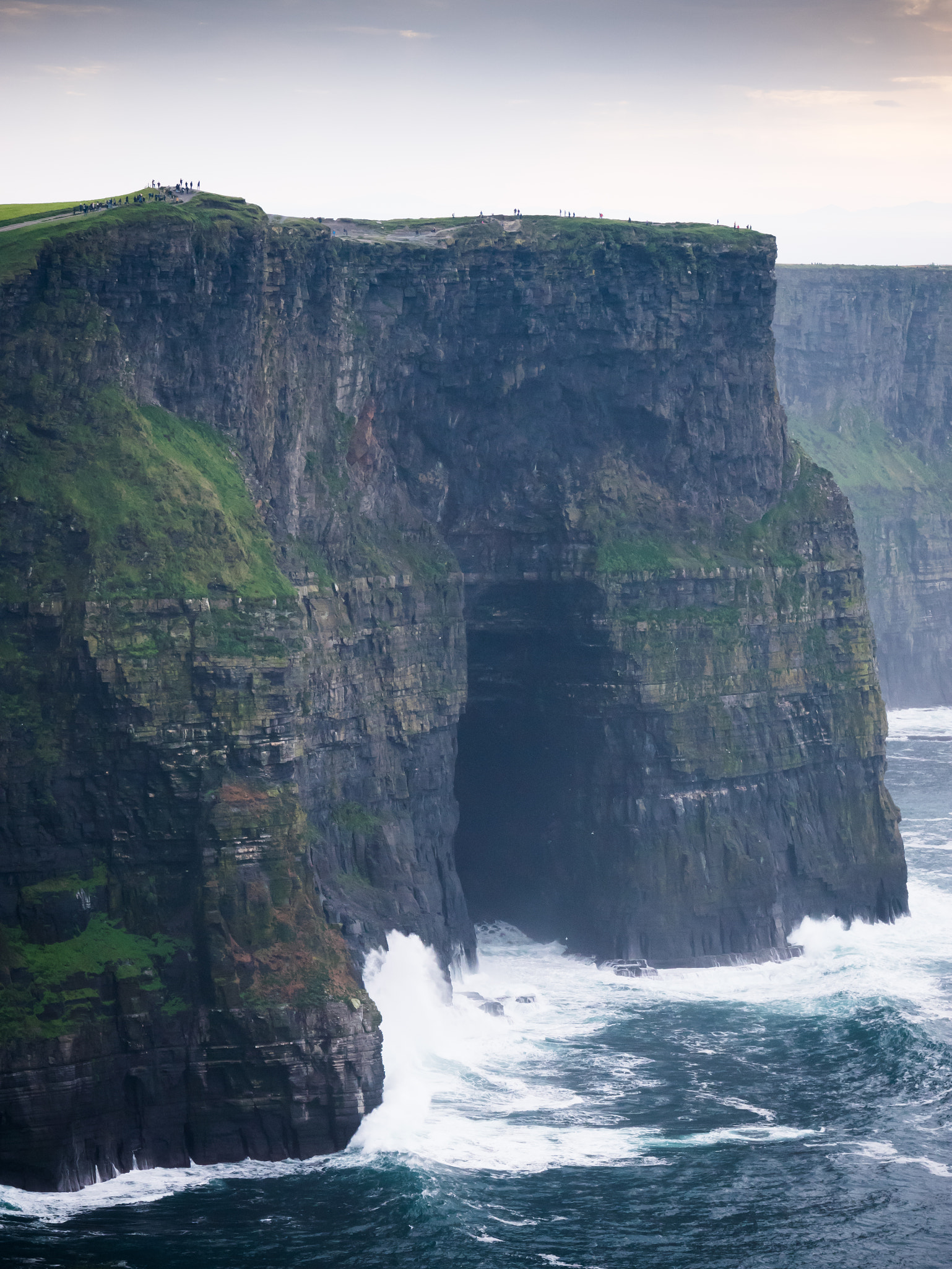 LUMIX G VARIO 35-100/F4.0-5.6 sample photo. Waves crashing against the cliffs of moher, county clare, ireland photography