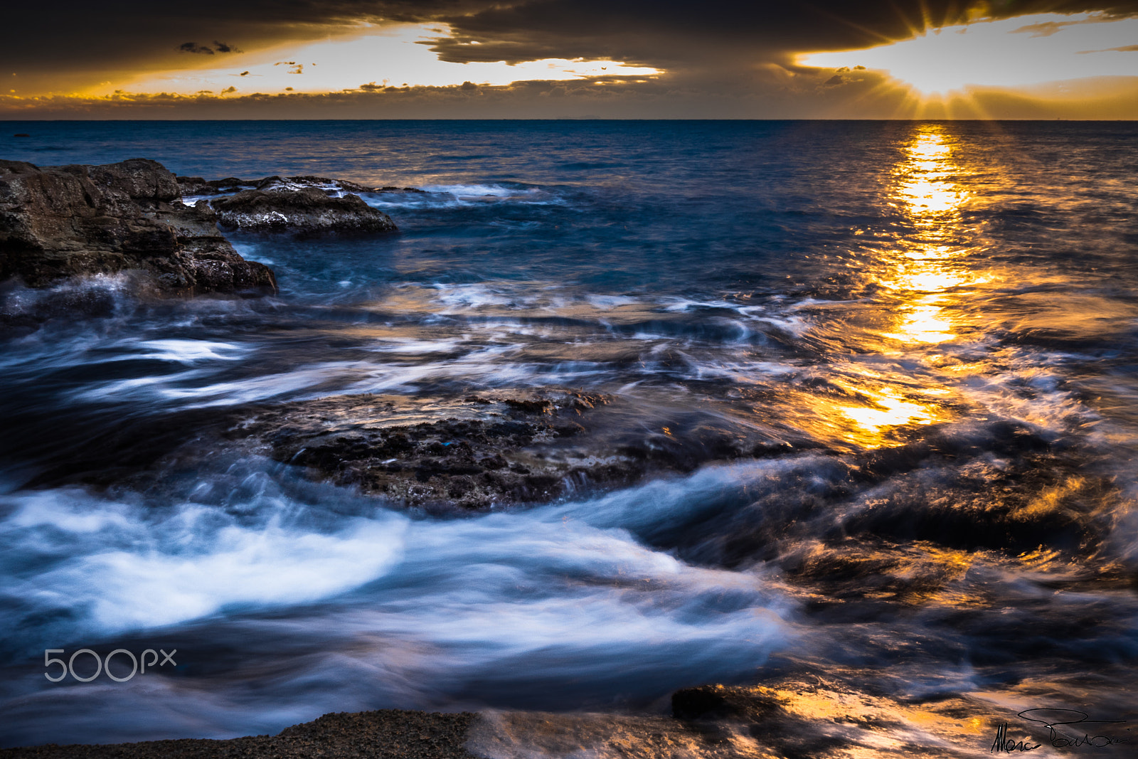 Olympus OM-D E-M1 + Olympus M.Zuiko Digital 17mm F1.8 sample photo. Waves at sunset photography